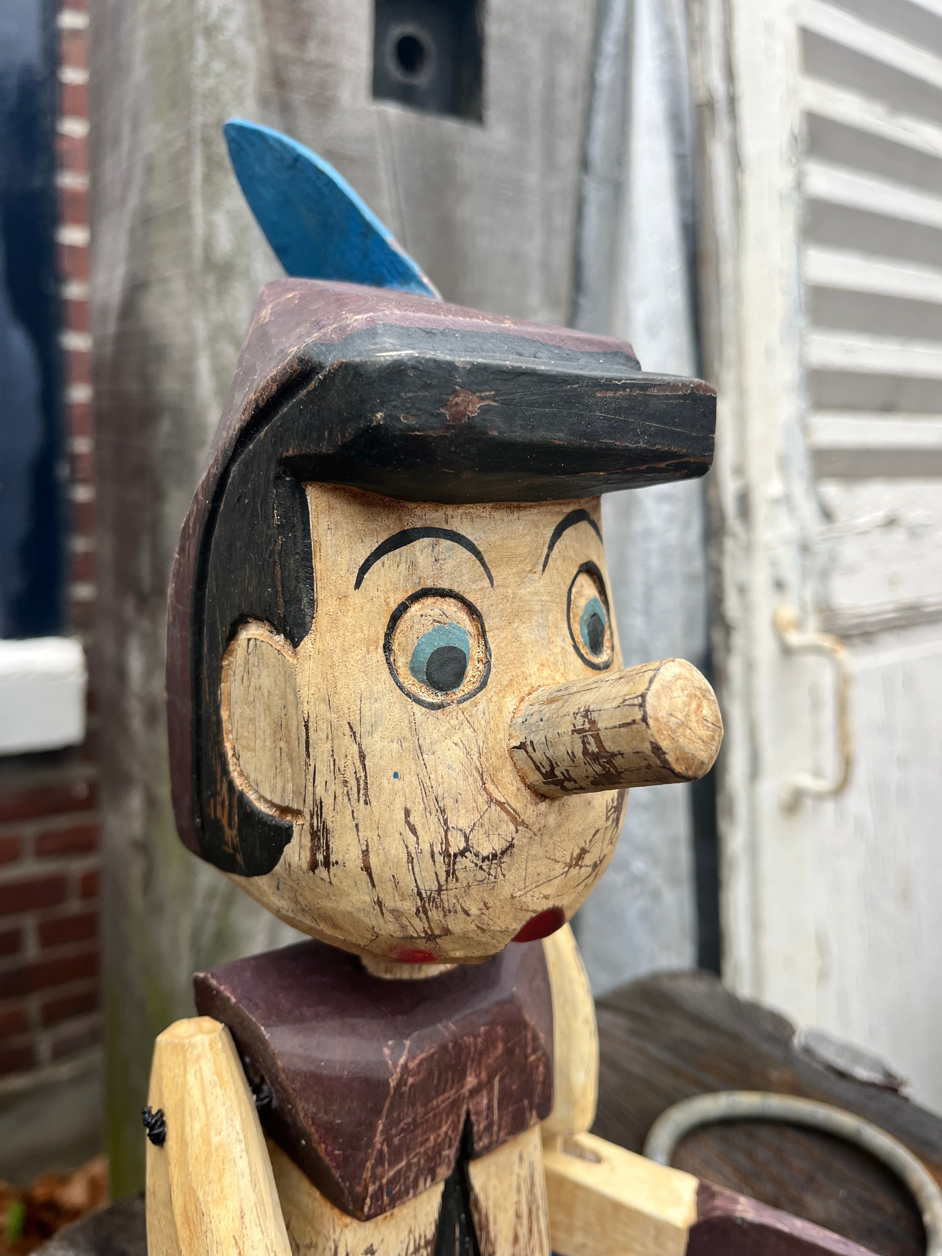 handgeschilderde houten Pinocchio middel - Brocante bij Ingie
