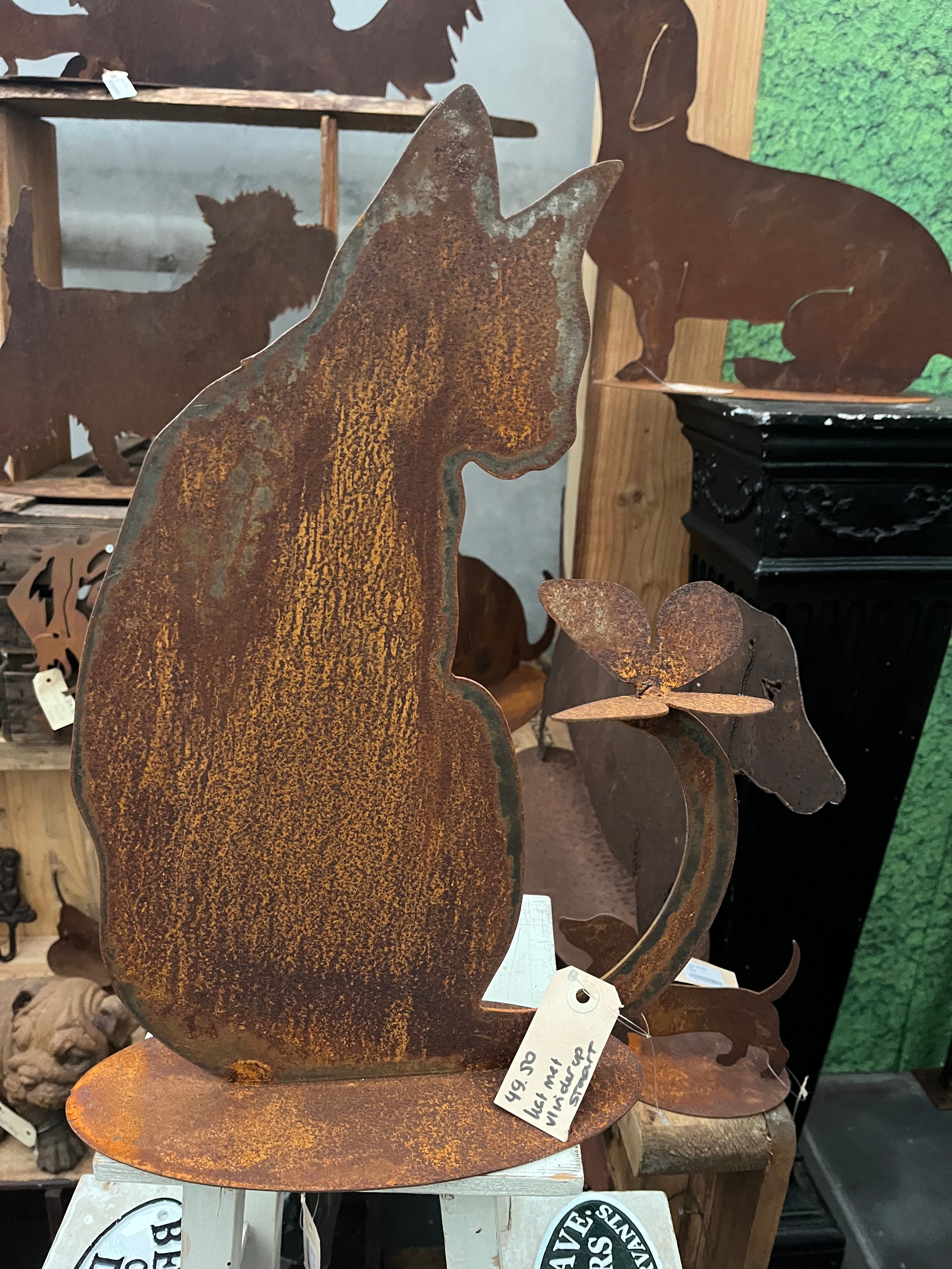 Kat met vlinder op staart op plaat van Ecoroest - Brocante bij Ingie