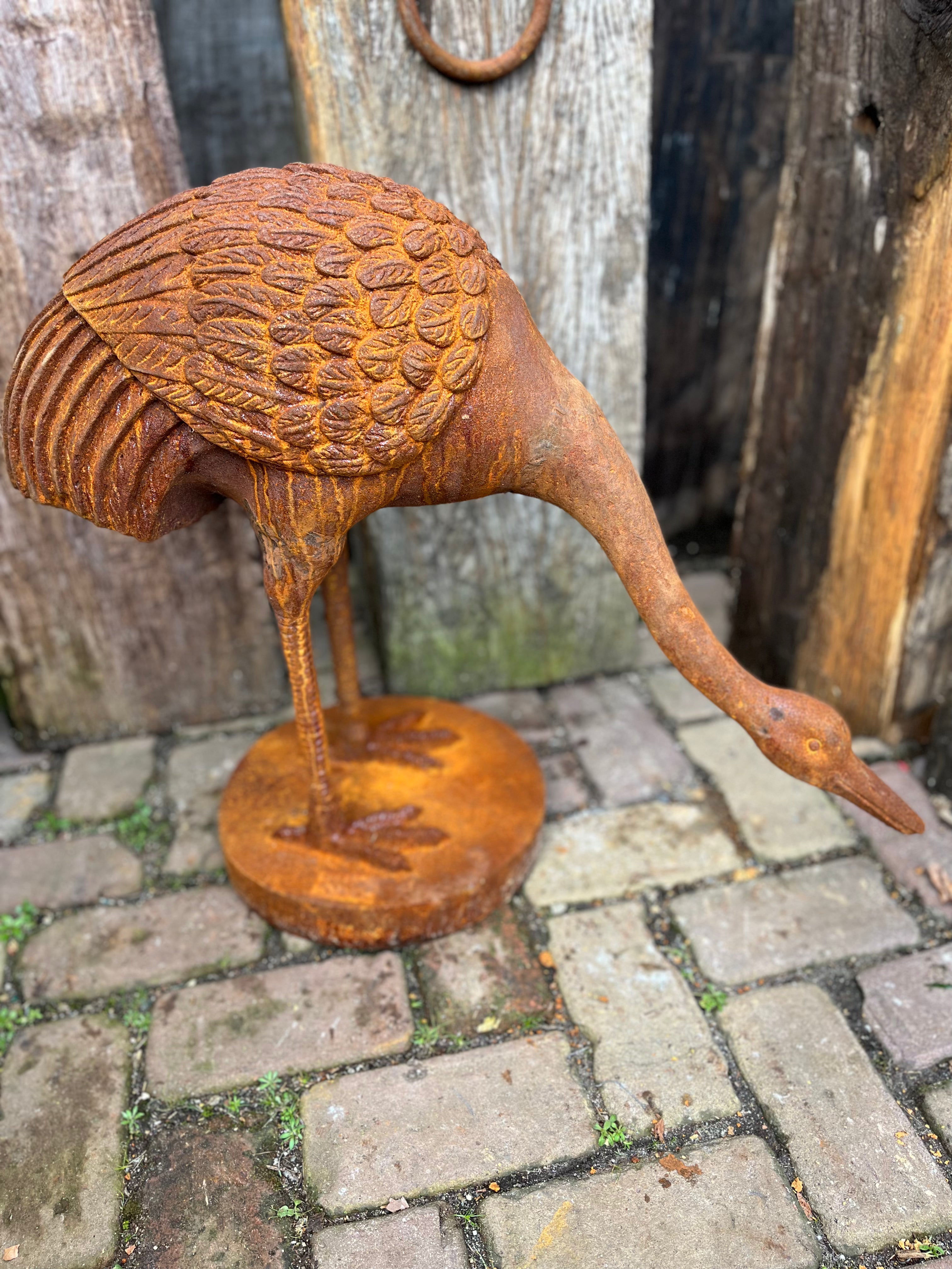 Reiger van gietijzer "kijkt naar beneden" - Brocante bij Ingie