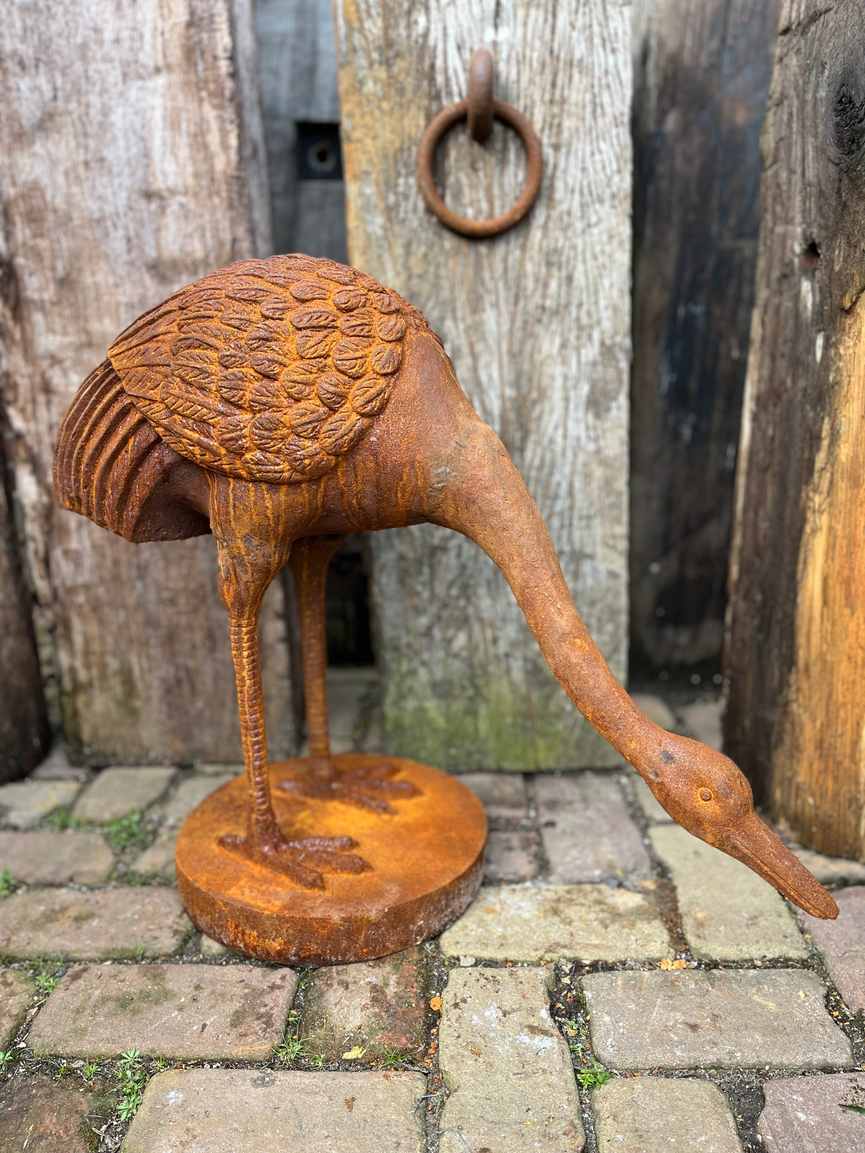 Reiger van gietijzer "kijkt naar beneden" - Brocante bij Ingie