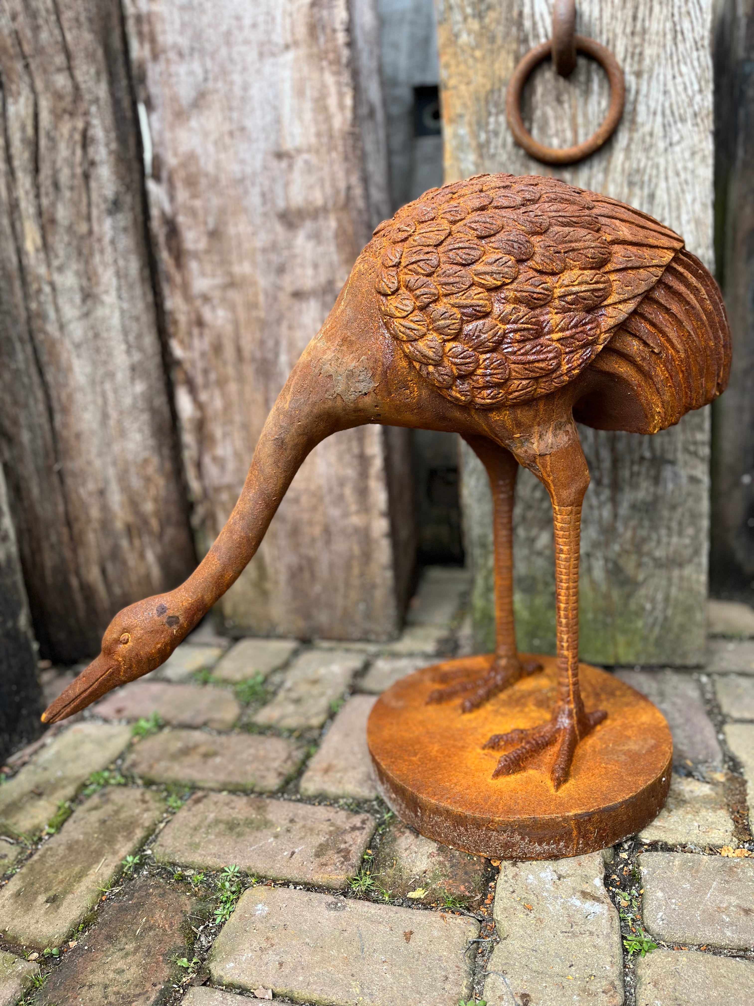 Reiger van gietijzer "kijkt naar beneden" - Brocante bij Ingie